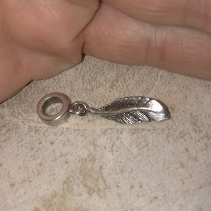 Feather charm